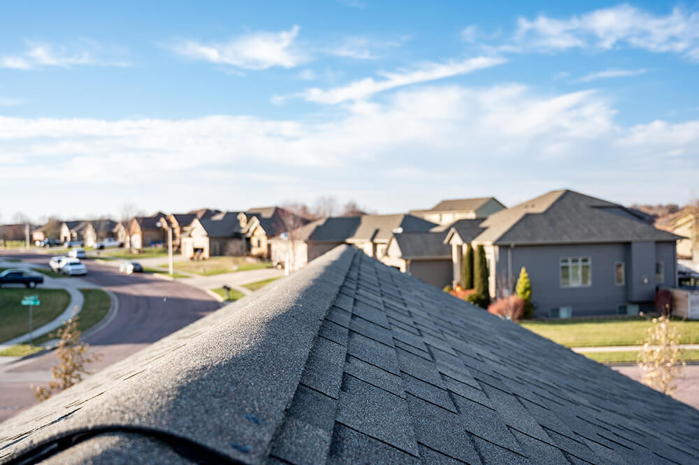 New asphalt shingle roof on a suburban home in Orange County
