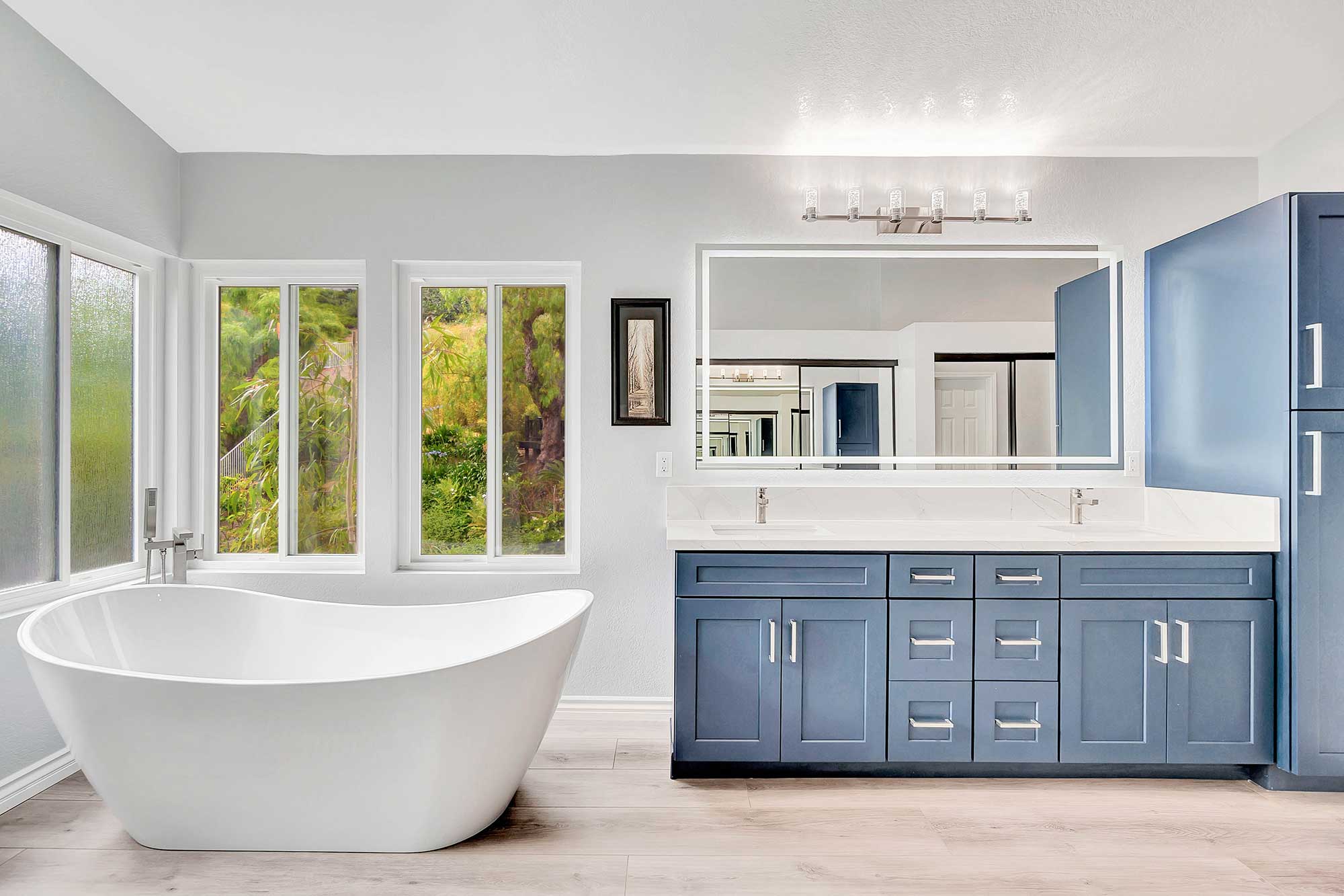 Luxury bathroom remodel with freestanding tub and double vanity in Orange County