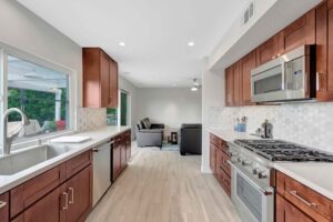 Warm-toned kitchen with wood cabinetry and natural lighting