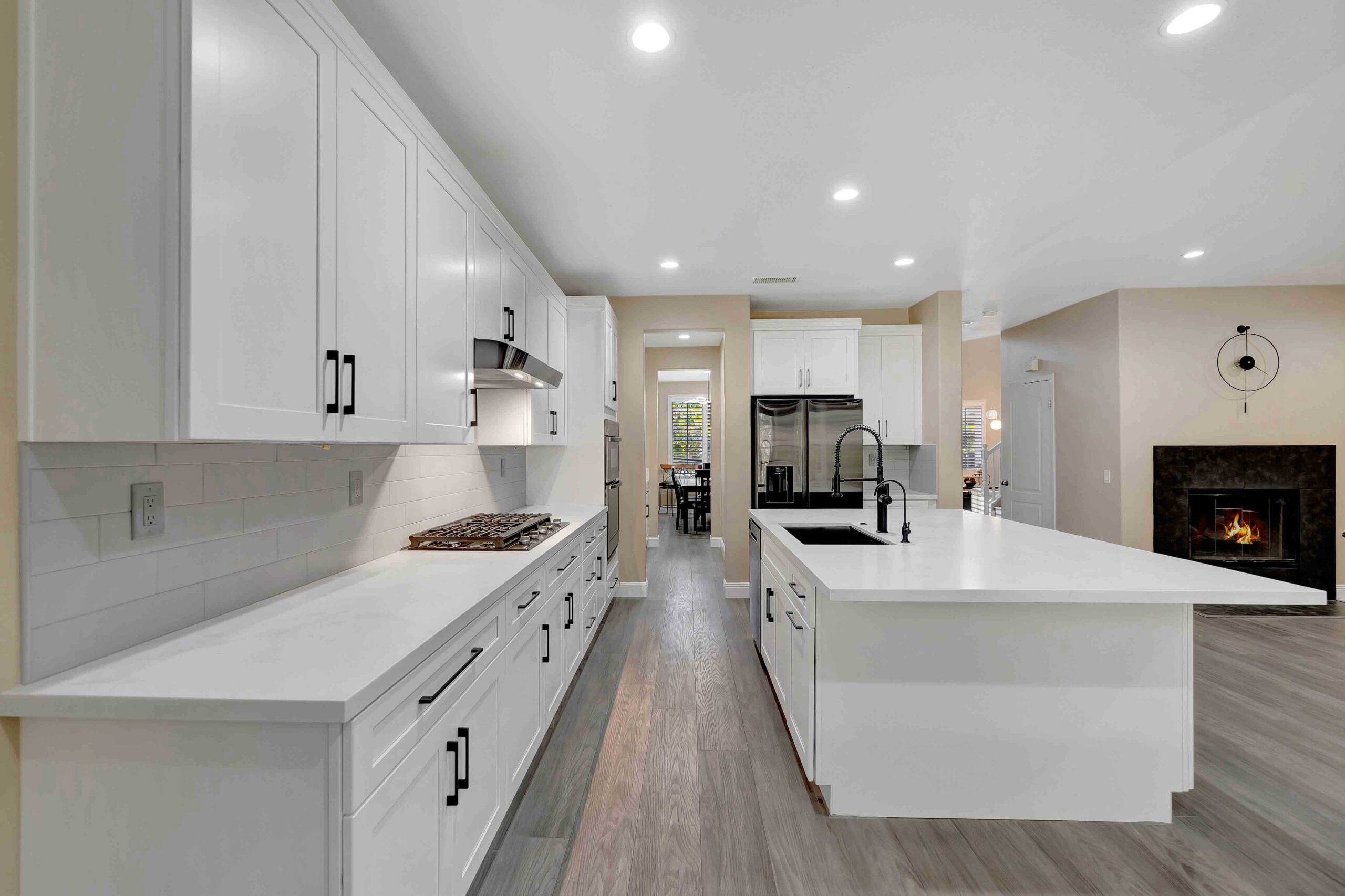 Open concept kitchen remodel with large island and modern appliances