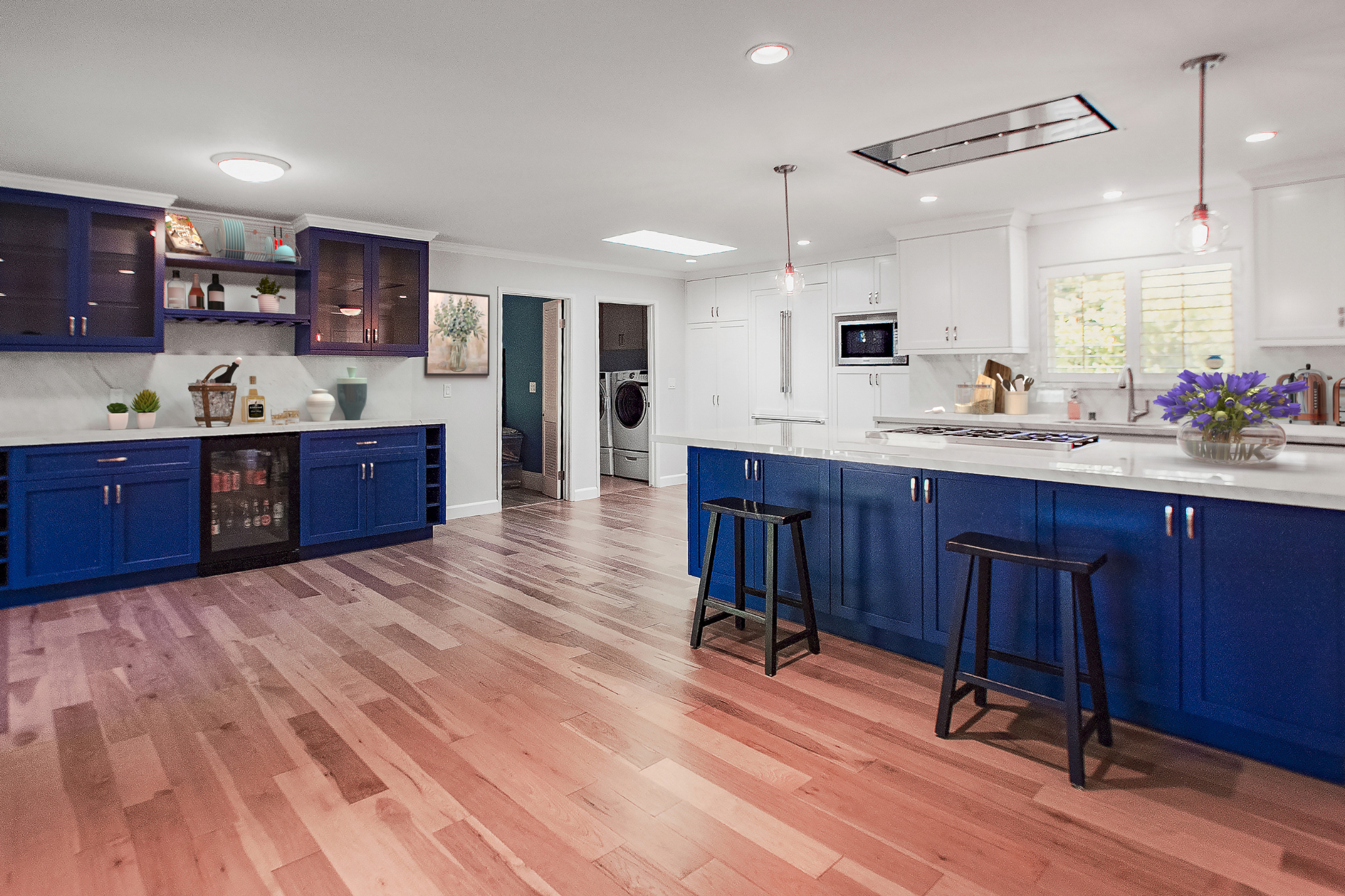 Laguna Niguel custom kitchen — blue island paint color and cabinet hardware close-up with hardwood floors.