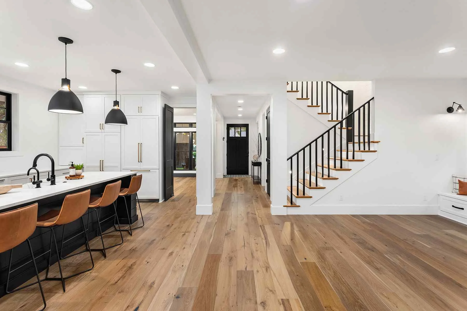 Complete home renovation open concept kitchen and staircase interior