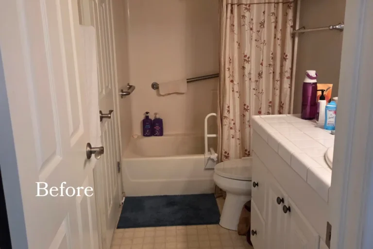 Before photo of an Irvine bathroom with a white vanity, tiled countertop, tub shower combo, and older finishes.