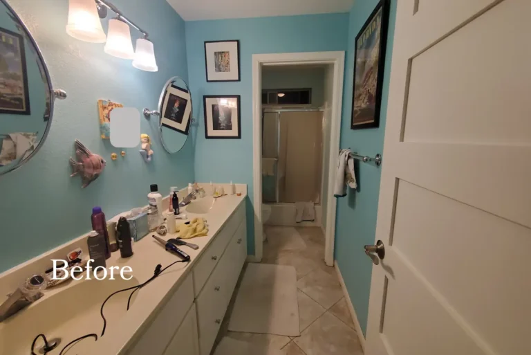 Dated Anaheim guest bathroom before remodeling, with a cream laminate vanity and turquoise painted walls.