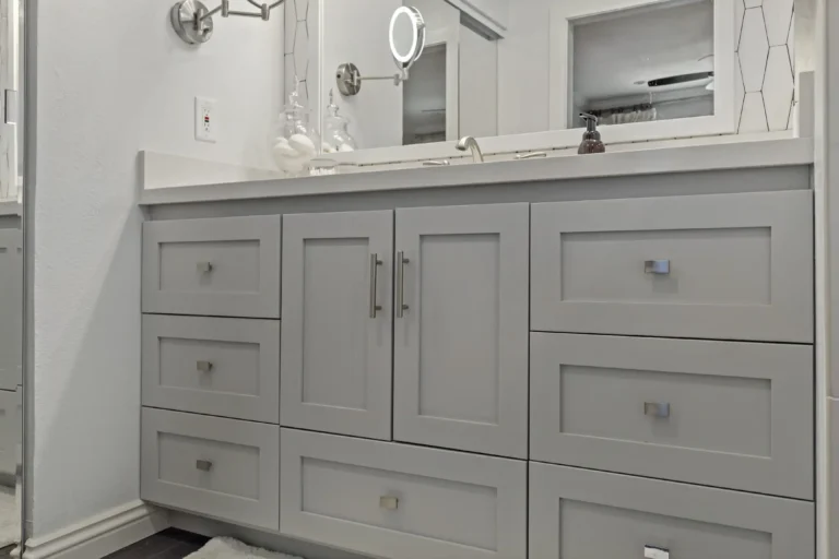 Mission Viejo bathroom vanity and glass shower—angled perspective.