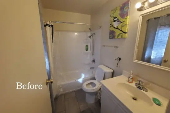 Before photo of a dated Laguna Niguel bathroom with a tub shower combo, shower curtain, and white vanity cabinet