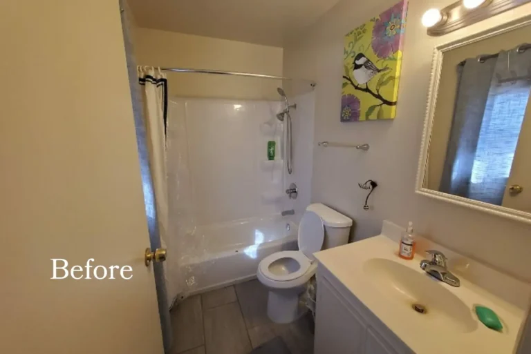 Before photo of the Newport Beach bathroom with the original curtained tub shower combo and dated white vanity