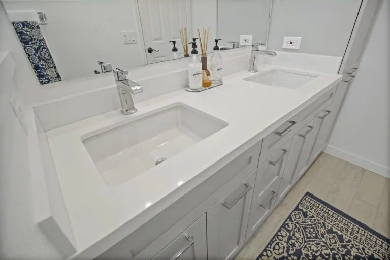 Anaheim bathroom remodel with white vanity and glass shower