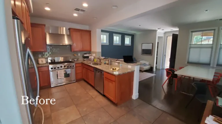 Before photo of the original Mission Viejo kitchen with honey wood cabinets, granite counters, and beige floor tile