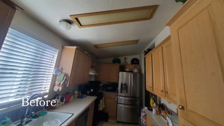 Before photo of a dated Torrance galley kitchen with honey wood cabinets, older counters, and framed ceiling lights
